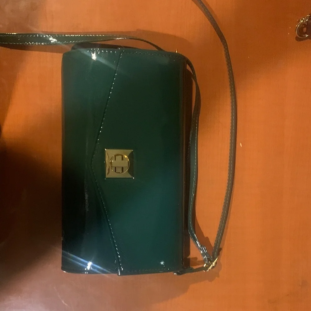Chic Green Patent Leather Crossbody Bag with glossy , reflective finish. - Picture 1 of 7